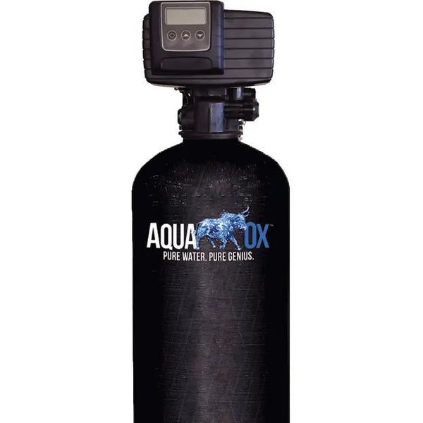 AquaOx whole house filter installed — stainless steel tank with no media replacement required for the life of the system