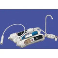 Crystal Quest countertop RO system dispensing pure water — multi-stage reverse osmosis removes lead, fluoride, and PFAS