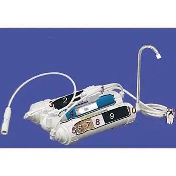 Crystal Quest countertop RO system dispensing pure water — multi-stage reverse osmosis removes lead, fluoride, and PFAS